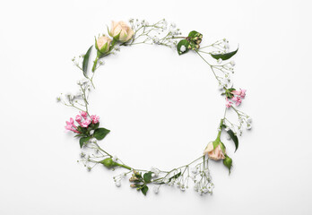 Frame made of beautiful gypsophila and other flowers on white background, top view. Space for text