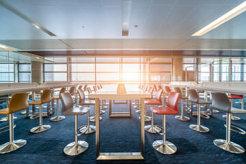 Fototapeta na wymiar Waiting area with seats in new airport terminal
