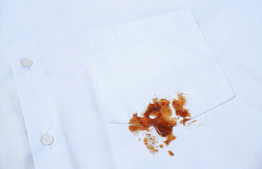dirty barbeque sauce stain on cloth at shirt bag from daily life activity for cleaning concept. housework care living life of people