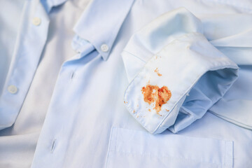 dirty barbeque sauce stain on cloth from daily life activity for cleaning concept. housework care...