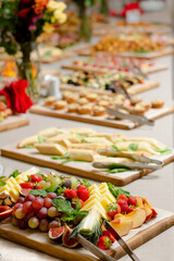Blurred image of a festive buffet table with different food.