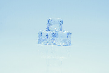 Obraz premium Ice crystal cubes, space for text or design.