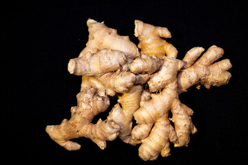 Ginger Roots on a dark background.