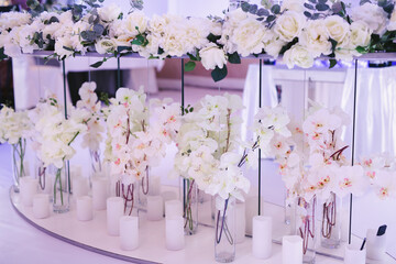 Beautiful wedding decor: flowers and candles.