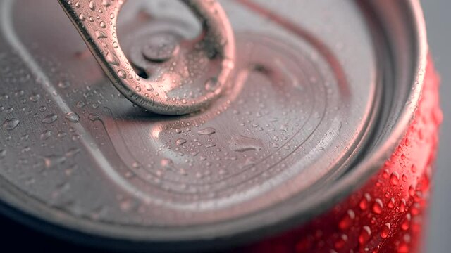 Cola can is opened in slow motion. Macro shot of the opening of the drink in can, Full HD Prores HQ 240 fps