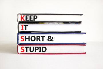 KISS keep it short and stupid symbol. Concept words KISS keep it short and stupid on books....