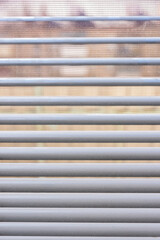 Obraz premium Closeup of white metal window shutter background and texture