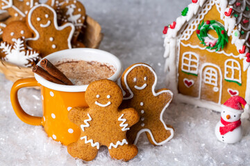 Cup of hot cinnamon milk and gingerbread man