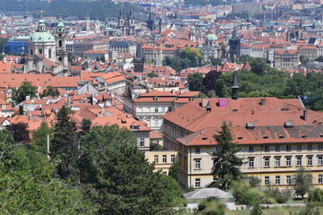 Fototapeta na wymiar Top view to red tile roofs of Prague city