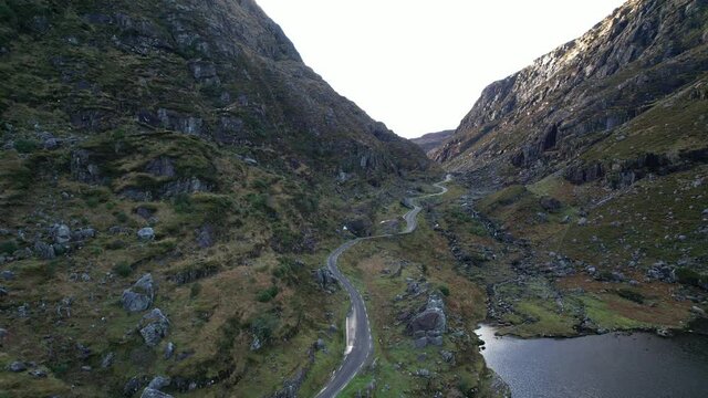 Aerial view of the winding roads at Gap of Dunloe in Ring of Kerry, a narrow mountain pass running north to south of county Kerry, Ireland
