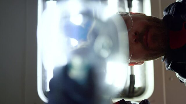Pov patient view of paramedics putting oxygen mask in emergency car