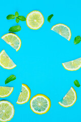 Fresh lemon pattern on a bright color background flat lay 