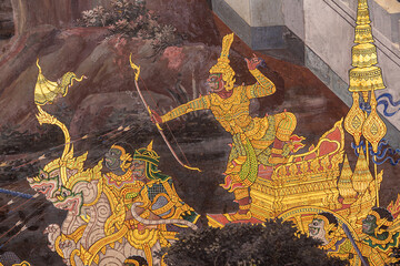 Gold color of old mural is the story of Ramakian ,Ancient fresco at Wat Phra Kaew temple in Bangkok, Thailand ,Generally in Thailand, any kinds of art decorated in Buddhist church, temple pavilion,