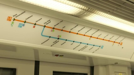 Metro map itinerary with next station indicator above entrance doors. Barcelona, Spain