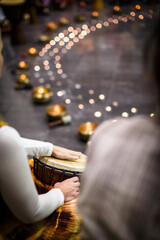 Group of people playing on drums - therapy by music