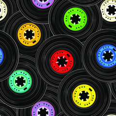 Vector seamless pattern of colorful vintage compact cassette coil with black tape.