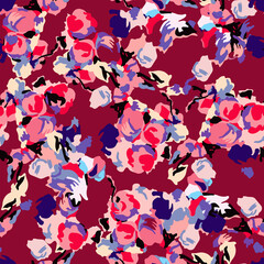 Colorful abstract red, fuchsia and blue abstract floral pattern on burgundy background.