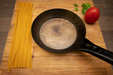 frying pan with vegetables