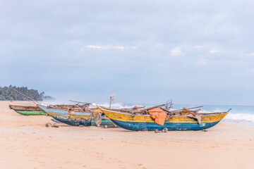 Fototapeta premium Tropical seascape with a boats on the beach