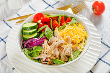Chicken Salad with fresh spinach, cucumber, cheese