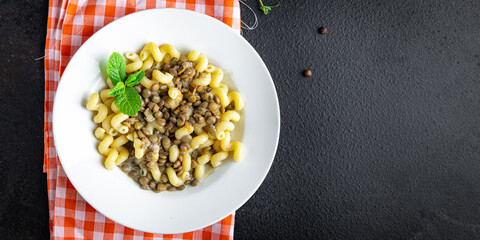 pasta lentil sauce healthy meal food snack on the table copy space food background rustic top view