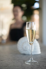 glass of champagne on the table