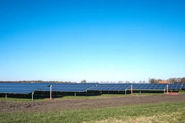 Küchenrückwand glas motiv Solar panels on farmland near Emmeloord, Noordoostpolder, Flevoland Province, The Netherlands © Holland-PhotostockNL