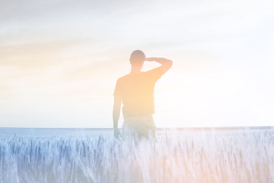 Man Silhouette And Field, Sky Soft Landscape. Light Delicate Pastel Color Tone. Nature Horizontal Background.