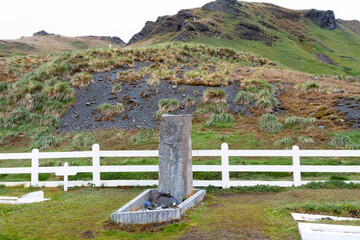 Southern Ocean, South Georgia, King Edward Cove, Grytviken, Grytviken whaling station. Sir Ernest Shackleton's grave site in the cemetery at Grytviken.
