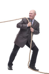 business man pulls a rope. isolated on a white