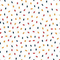 Colorful sprinkles seamless pattern with white background.