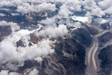 Fototapeta premium Aerial view of snow mountain and glacier on Tibetan Plateau, China