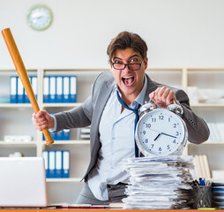Angry aggressive businessman in the office