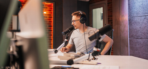 The DJ hosts the program and communicates with the audience on air at the radio station. The...