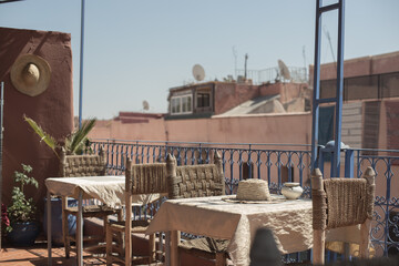 Sunny terrace in a restaurant in Morocco  adobe building brown tones 