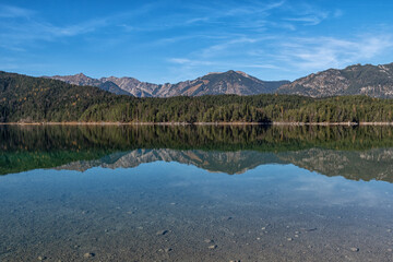 The Eibsee a mountain lake in the German Alps