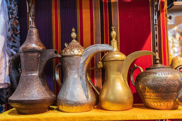 Middle East, Arabian Peninsula, Oman, Muscat, Muttrah. Traditional tea pots in the Muttrah souk.