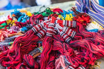 Middle East, Arabian Peninsula, Oman, Al Batinah South, Sinaw. Decorative tassels for sale at the souk in Sinaw, Oman.