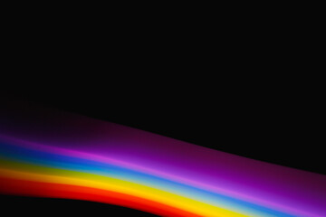 Colored lines of light on a black background.