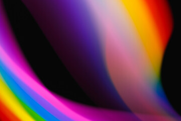 Colored lines of light on a black background.