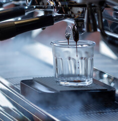 professional coffee machine makes espresso