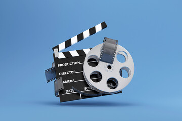 Cinema Clap and Film Roll on blue studio background