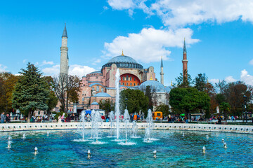 The famous Hagia Sophia located in Istanbul Turkey with its fountain view.