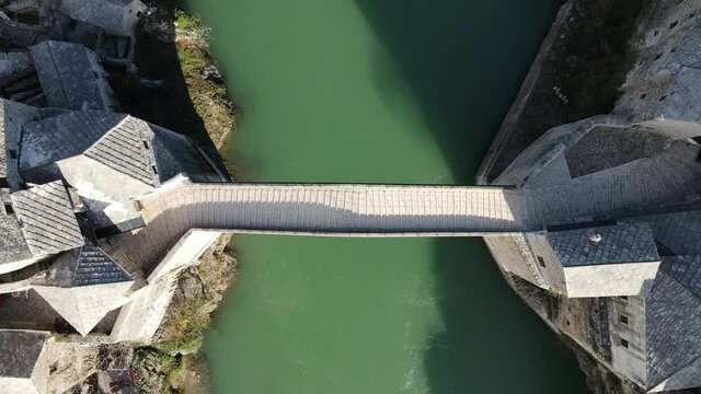 Footage Aerial View to Old Bridge (Stari Most) in Mostar and the river Neretva in Bosnia and Herzegovina