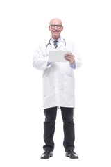 smiling doctor with a digital tablet. isolated on a white