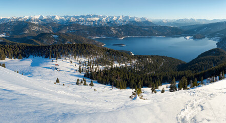 View towards lake Walchensee and the Karwendel mountain range. View from Mt. Jochberg near lake Walchensee during winter in the Bavarian Alps. Germany, Bavaria