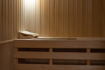 Small home sauna trimmed with linden wood.