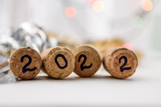 New Year's background. Bottle caps with the inscription 2022