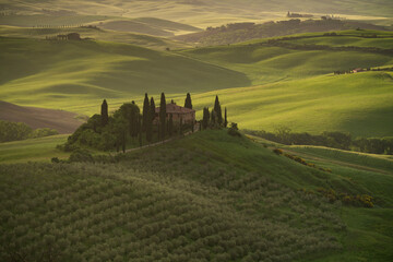 Europe, Italy, Tuscany, Val d'Orcia. Belvedere farmhouse at sunrise .
