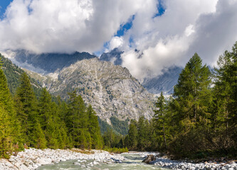 Obraz premium River Sarca, view towards Presanella mountain range. Val di Genova in the Parco Naturale Adamello, Brenta, Trentino, Italy, Val Rendena